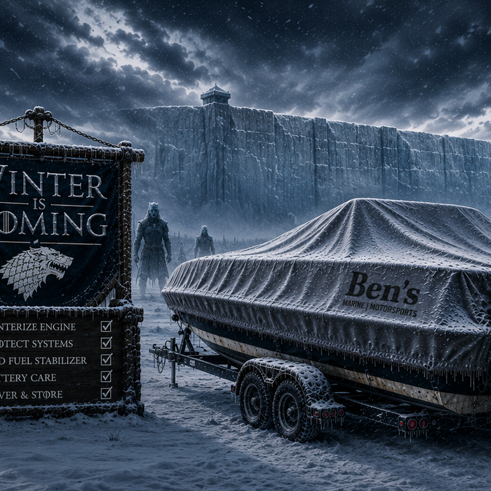 Covered boat on a trailer in winter with Ben's Marine branding, surrounded by a frozen Minnesota landscape