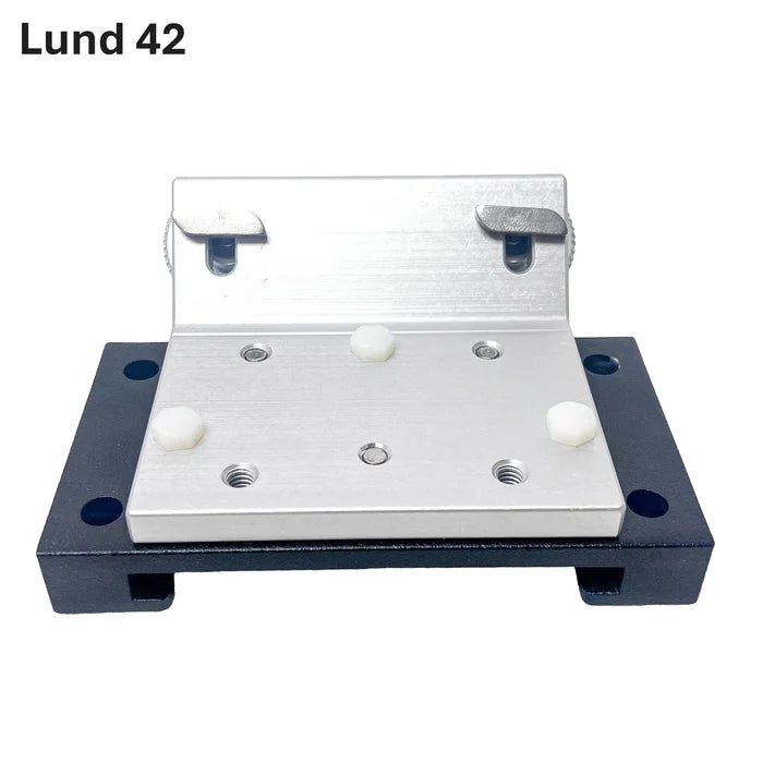 A metal mounting bracket assembly with a brushed silver aluminum plate and a black base plate, shown on a plain white background with the text 'Lund 42' in the top left. Beatdown Sport Track Breakaway Transducer Pole
