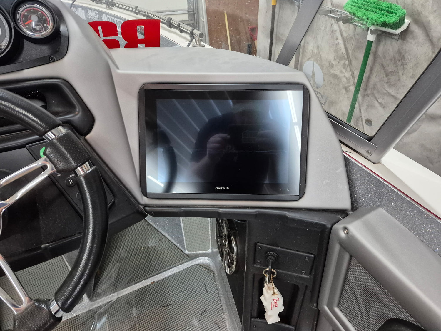 Boat electronics system showing completed Install Fish Finder and Transducer setup with tidy wiring